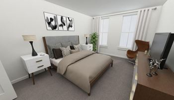a bedroom with a bed and a desk with a chair